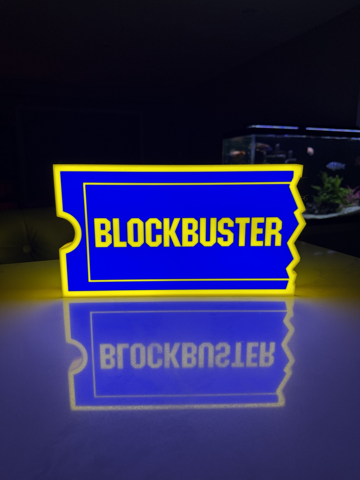 Blue and yellow Blockbuster themed illuminated lightbox