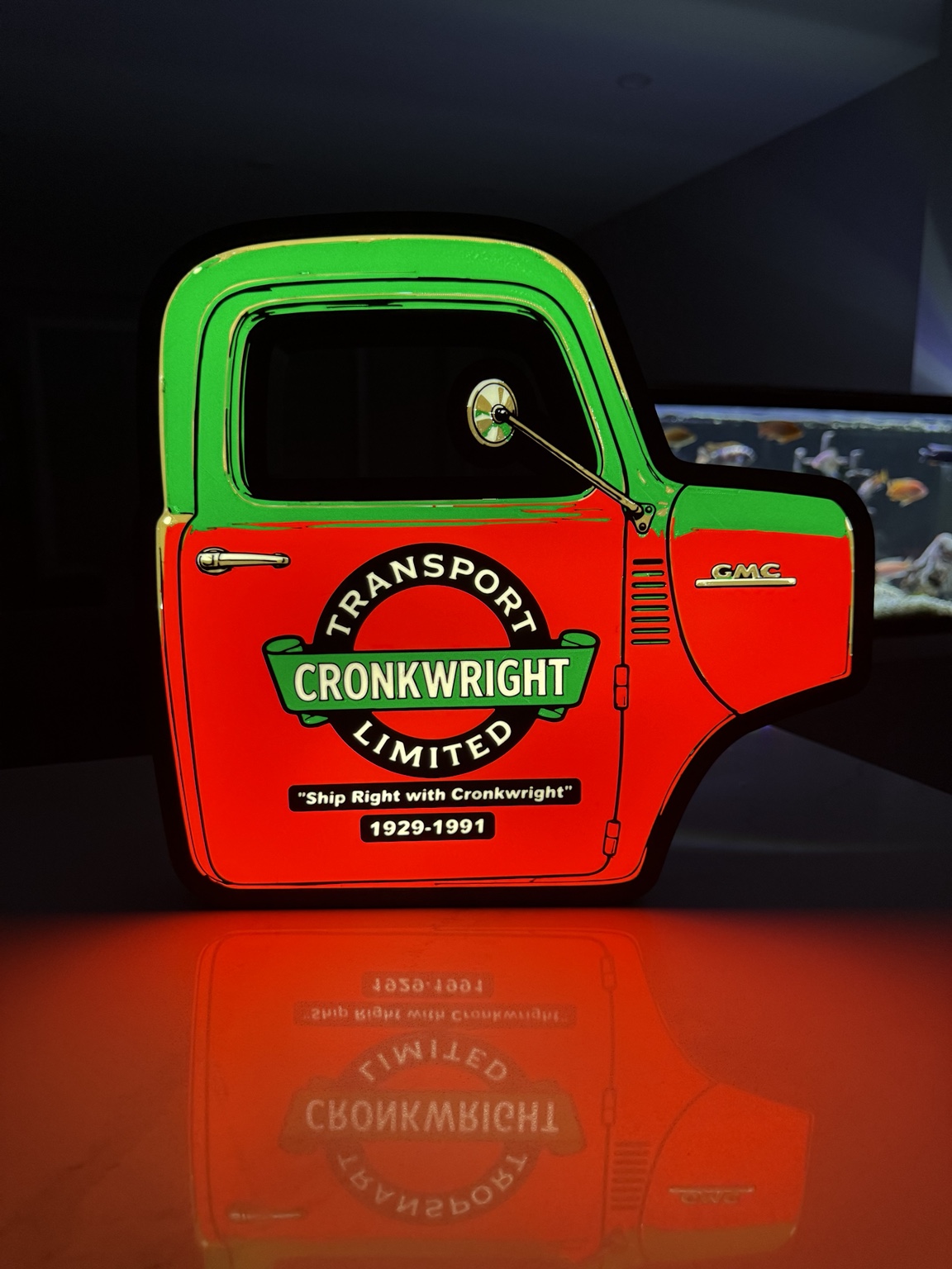 Red and green Cronkwright Transport GMC truck door shaped lightbox