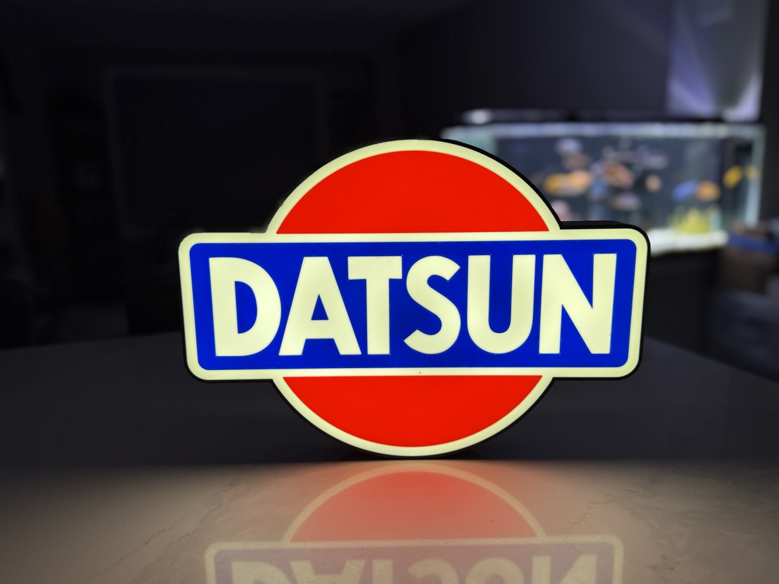 Datsun red white and blue emblem illuminated lightbox