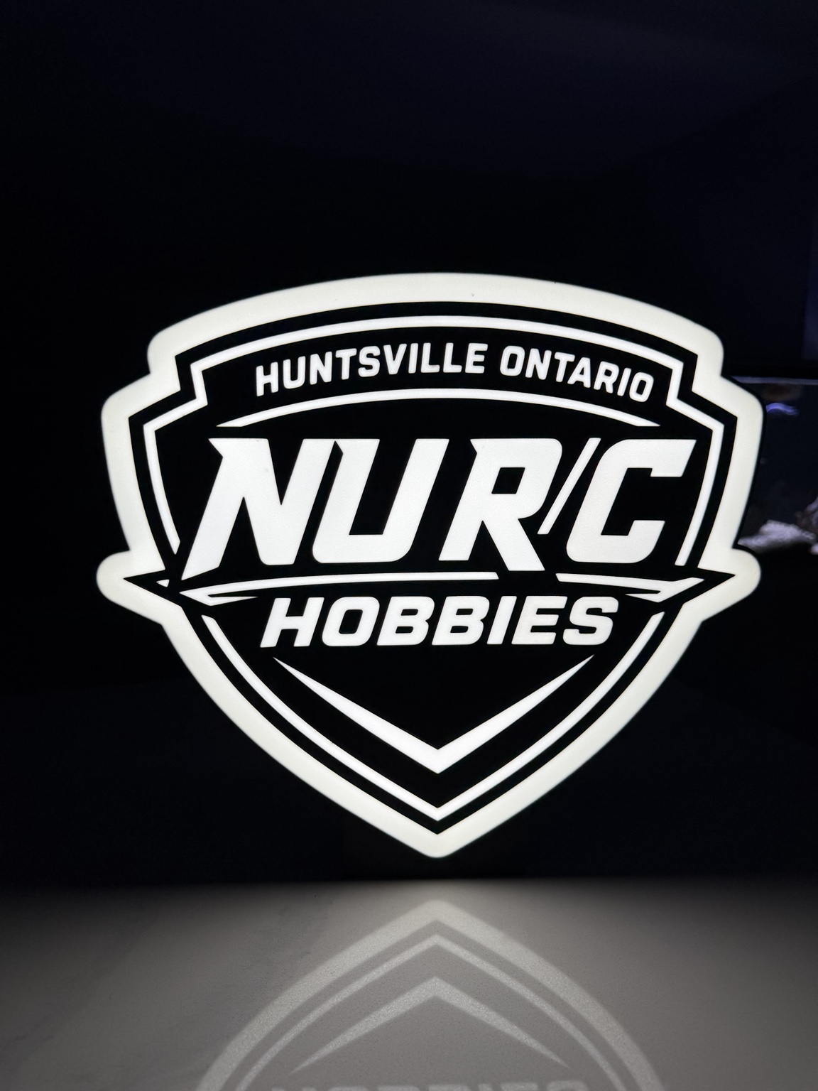 White NRC Hobbies lightbox with Huntsville Ontario lettering