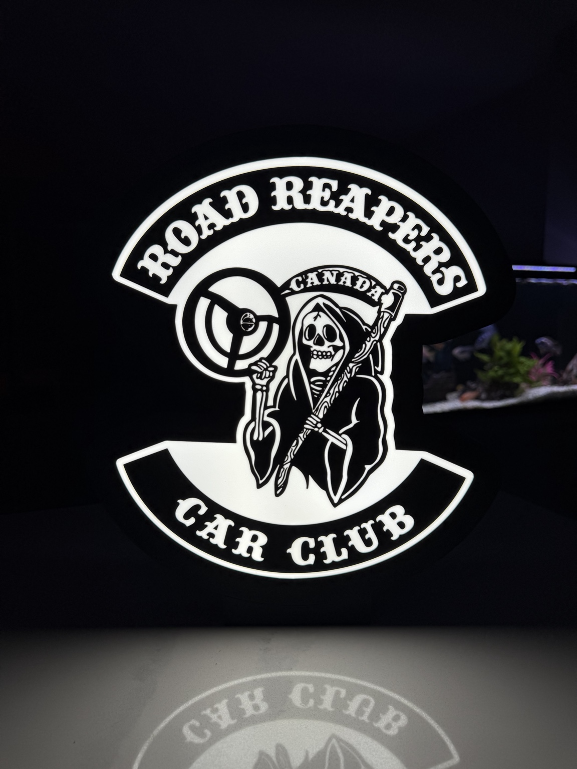 Black and white Road Reapers Canada Car Club lightbox with reaper artwork