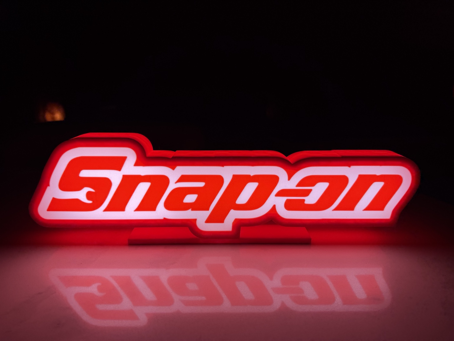 Red and white Snap-on illuminated wordmark