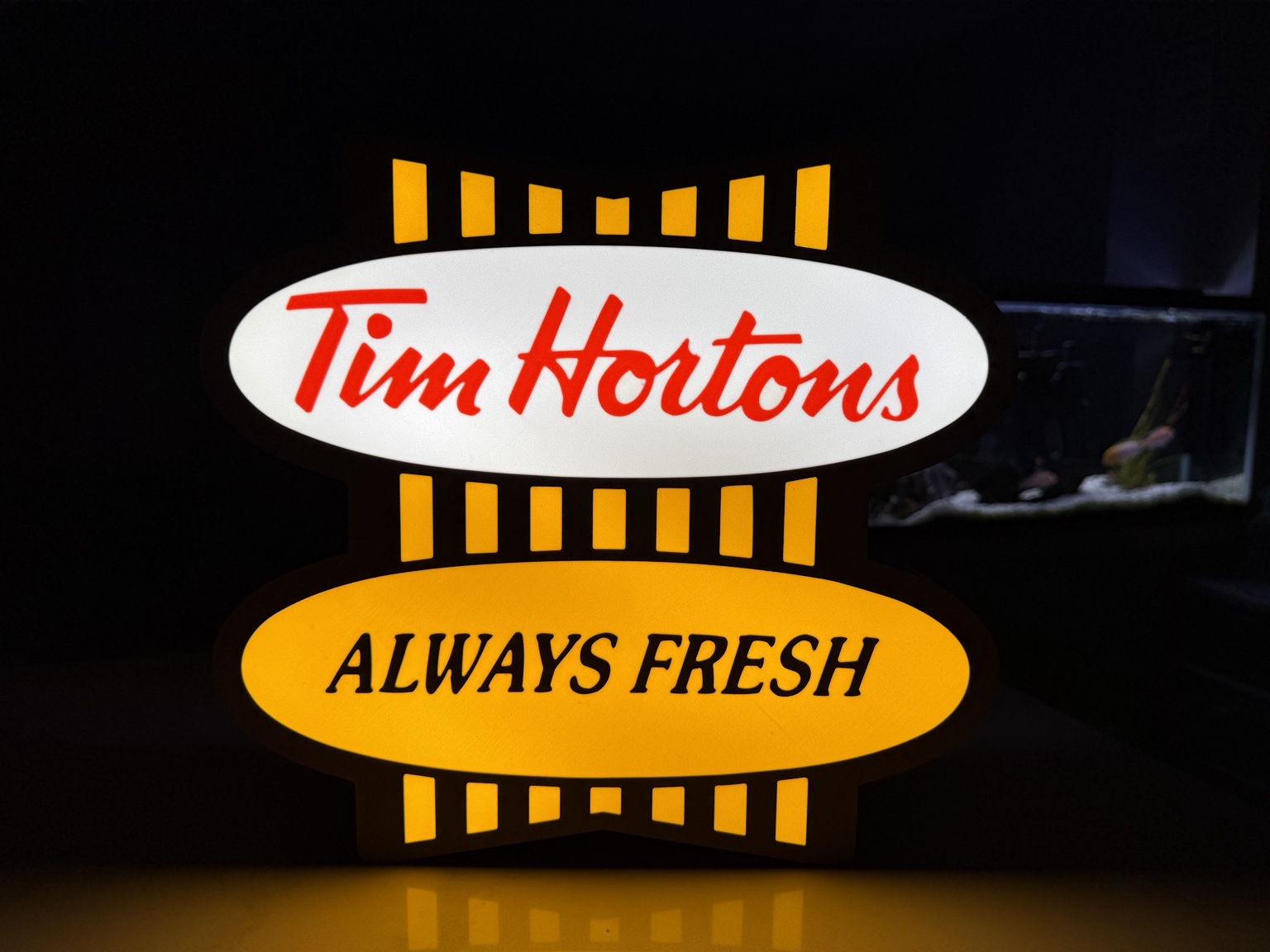 Tim Hortons Always Fresh yellow and white illuminated sign