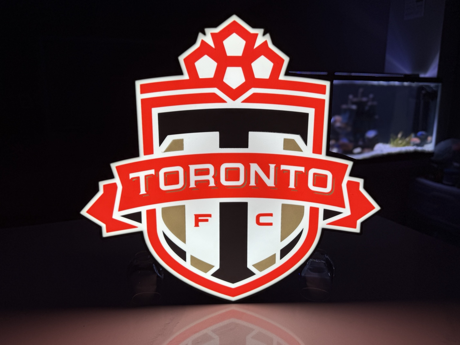 Red white and black Toronto FC crest illuminated lightbox